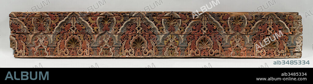 Panel with Cusped Arches, 14th century, From Morocco, Wood (cedar); carved and painted, H. 19 in. (48.3 cm), Wood, Marinid architecture shared many characteristics with that of Andalusia. In both traditions, carved wooden friezes, usually placed near the ceiling above panels of stucco, constituted an important part of interior decoration.