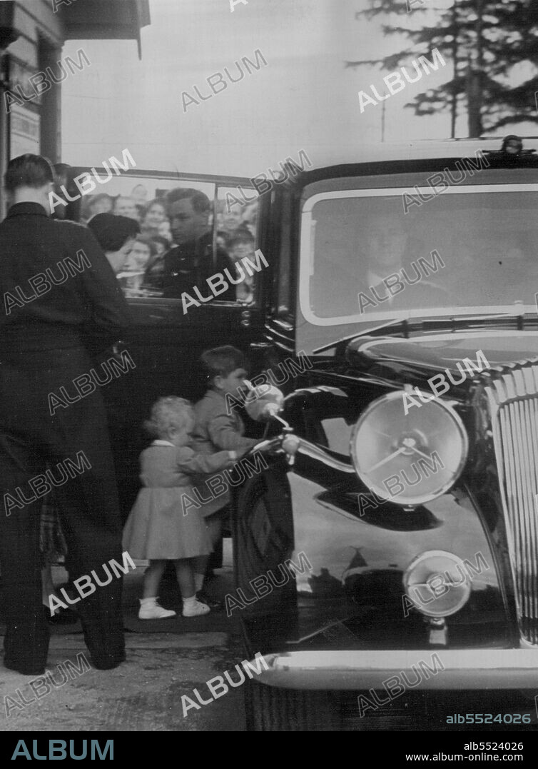 The Royal Family Arrives In Scotland -- Little Prince Charles and Princess Anne photographed about to enter the Royal car, followed by the Queen on their arrival at Ballater Station on their way to Balmoral Castle.
H.M. The Queen, Prince Philip and their two children Prince Charles and Princess Anne, arrived yesterday at Balmoral Castle for their first holiday there since the Queen's accession. May 28, 1952. (Photo by Fox Photos).