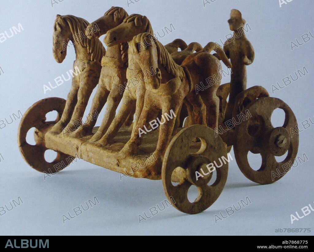 CARRO DE CABALLOS CON AURIGA-GRECIA/BOECIA- 600/550 D.C- TERRACOTA.