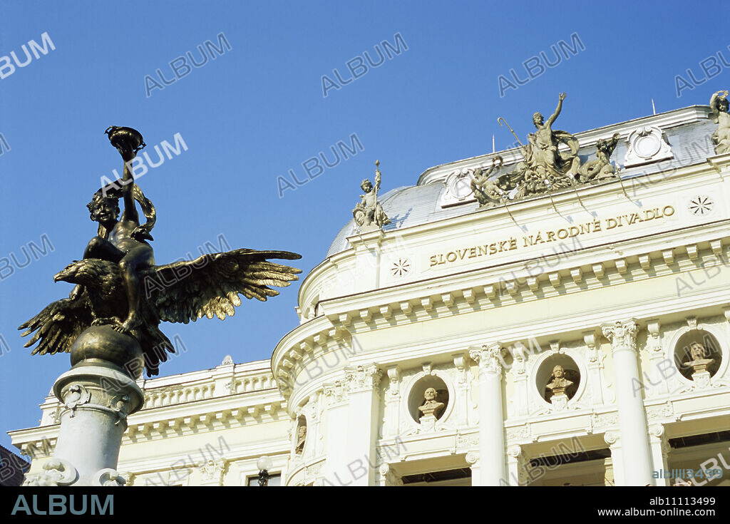 Statue and detail of facade of Bratislava's neo-baroque Slovak National Theatre, now major opera and ballet venue, Bratislava, Slovakia, Europe.