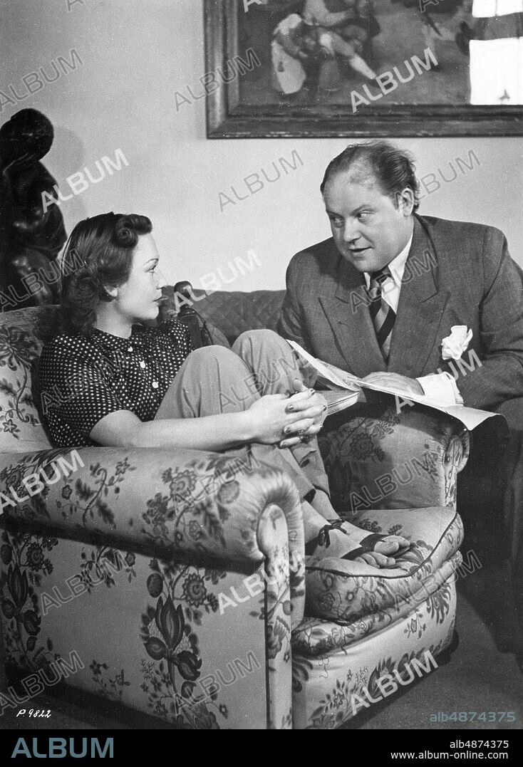 GERMANY BERLIN 1943-01-28 Orig. caption ... A FAMOUS GERMAN FILM ARTIST COUPLE IN HIS BERLIN HOME. Heli Finkenzeller and Will Dohm - both prominent names in German film - have already won many hearts abroad in large and small roles. Picture 3: The couple at the joint role study. Photo: Photo UFA / AB Text & Bilder / SVT / Code: 5600 Folder: Finkenzeller, Heli H Finkenzeller, 1911-1991, German actor W Dohm, 1897-1948, German actor Photo series Photo report Study Script persons: HELI FINKENZELLER; WILL DOHM sites : BERLIN; GERMANY.