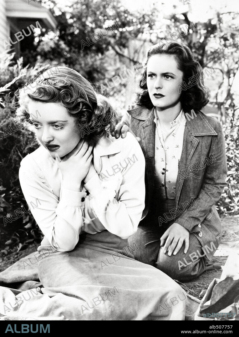 BETTE DAVIS and GERALDINE FITZGERALD in DARK VICTORY, 1939, directed by EDMUND GOULDING. Copyright WARNER BROTHERS.