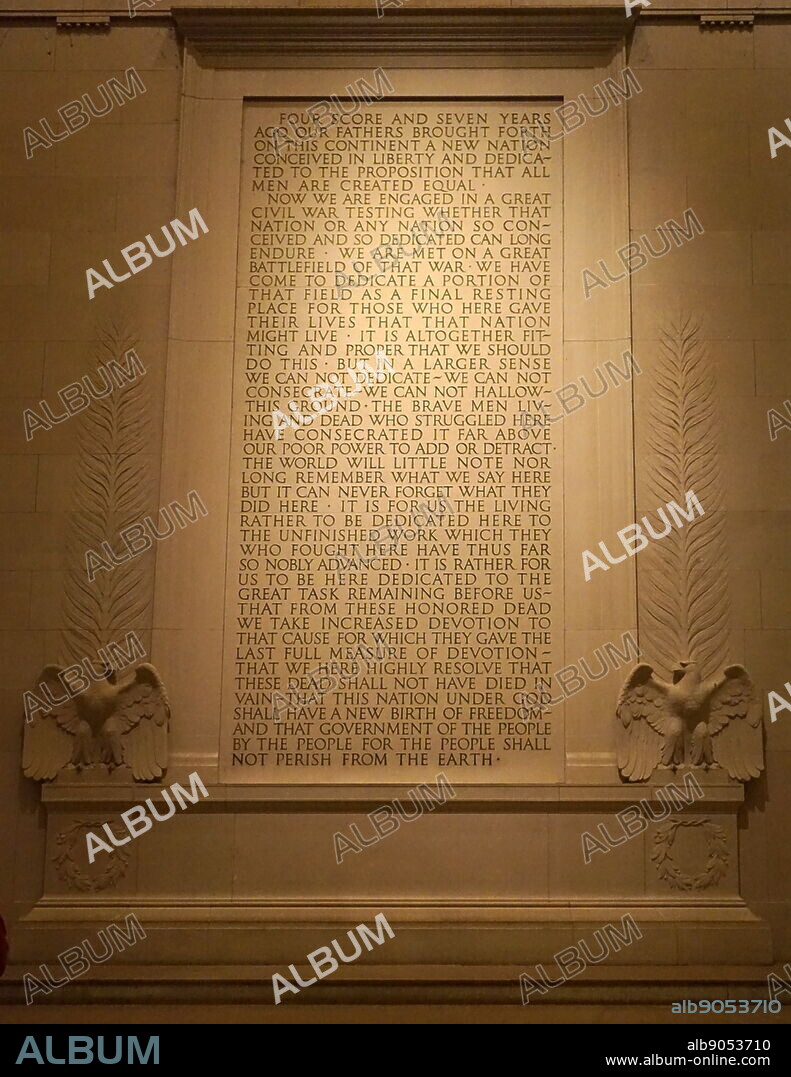 Abraham Lincoln's Gettysburg Address inscribed on a wall of the Lincoln Memorial, an American national monument built to honour the 16th President of the United States, Abraham Lincoln, at night. Dated 21st Century.