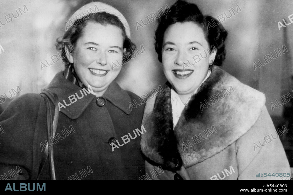 Women Golfers Return Hole To Britain. -- British golfers Miss Bridget Jackson, 19, left, and Miss Veronica Anstey 20, are pictured on their arrival in Britain this week after a successful tour of Australia and New Zealand as part of the British women's junior golf team. Most successful team member was Miss. Anstey, Warwickshire county women's champion, she won the Australian and New Zealand women's championships and the Victoria championships. December 21, 1955.