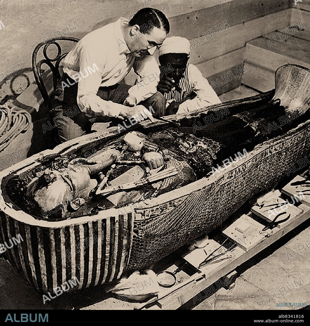 HARRY BURTON. Howard Carter with Coffin of Tutankhamun.