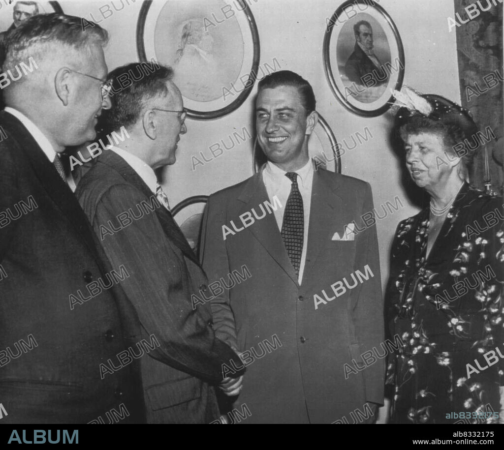 Roosevelt Becomes Congressman - Rep. Franklin D. Roosevelt, Jr., democrat, 20th New York District, (second from right) is congratulated by acting speaker of the House John W. McCormack (D-Mass) (second from left) in the speaker's office after the new congressman was sworn in on the House floor. His Mother, Mrs. Elenor Roosevelt and his sponsor, Rep. Walter A. Lynch (D-Ny) (Left), look on. June 14, 1949. (Photo by AP Wirephoto).