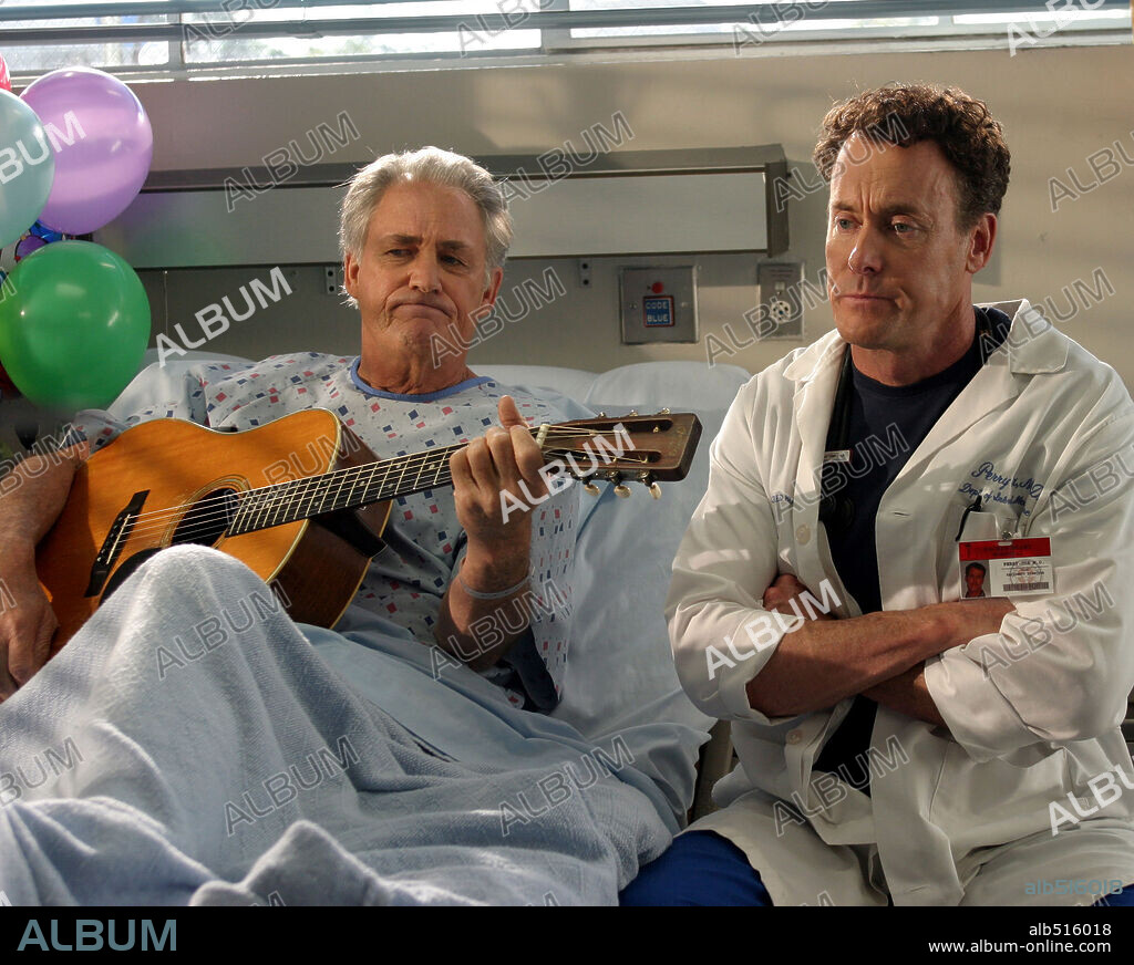 JOHN C. MCGINLEY and JOHN PERRY in SCRUBS, 2001, directed by ADAM BERNSTEIN. Copyright NBC.