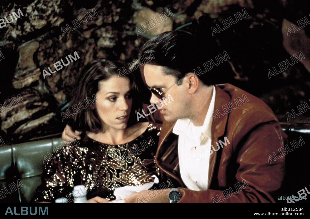 FRANCES McDORMAND and TIM ROBBINS in SHORT CUTS, 1993, directed by ROBERT ALTMAN. Copyright SPELLING FILMS INTERNATIONAL.