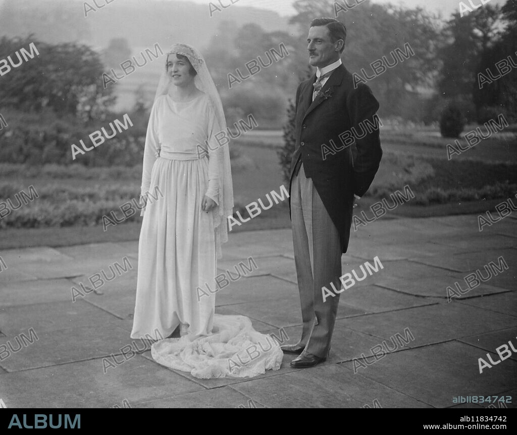 The wedding took place at Horningsham Church , near Warminster , between Lady Emma Thynne , and the Marquis of Northampton . The Bride and Bridegroom after the ceremony . 15 October 1921.