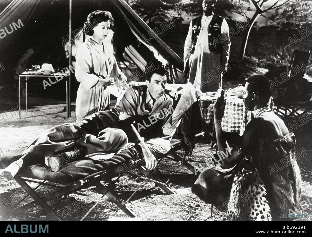 GREGORY PECK and SUSAN HAYWARD in THE SNOWS OF KILIMANJARO, 1952, directed by HENRY KING. Copyright 20TH CENTURY FOX.