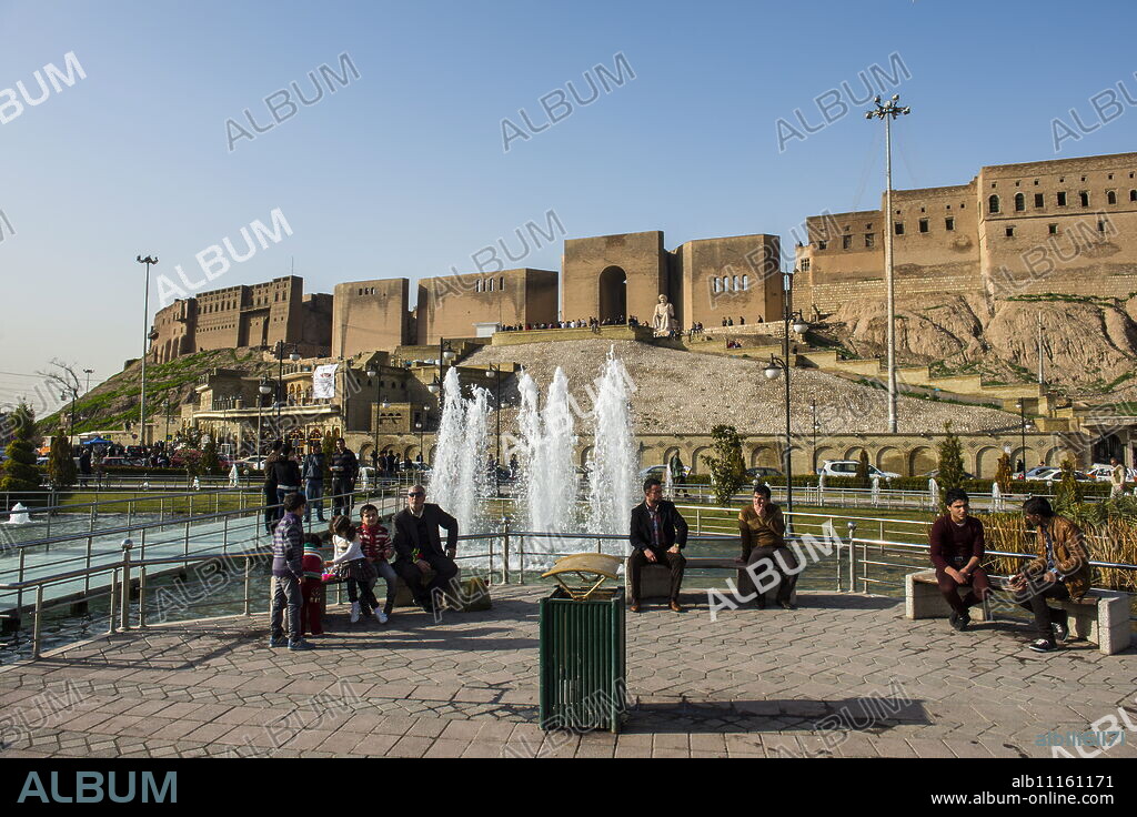 Huge square with water fountains below the citadel of Erbil (Hawler), capital of Iraq Kurdistan, Iraq, Middle East.
