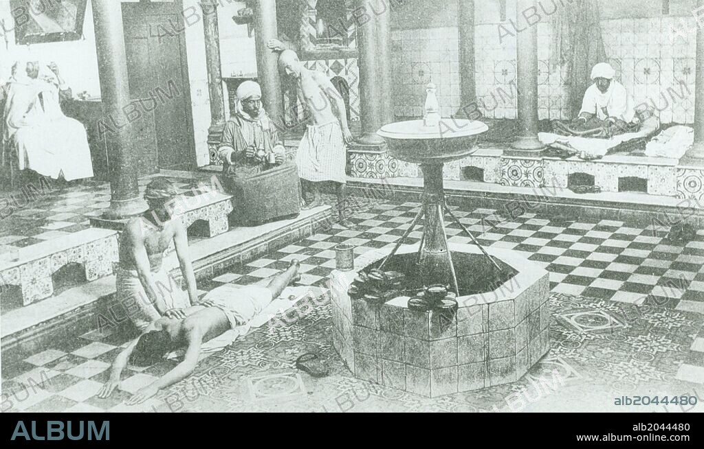 A hamam or Turkish bath with a masseur. North African circa 1900.