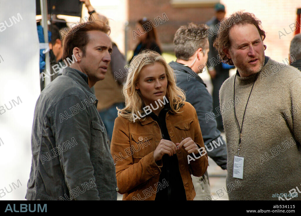 DIANE KRUGER, JON TURTELTAUB and NICOLAS CAGE in NATIONAL TREASURE, 2004, directed by JON TURTELTAUB. Copyright TOUCHSTONE PICTURES / ZUCKERMAN, ROBERT.