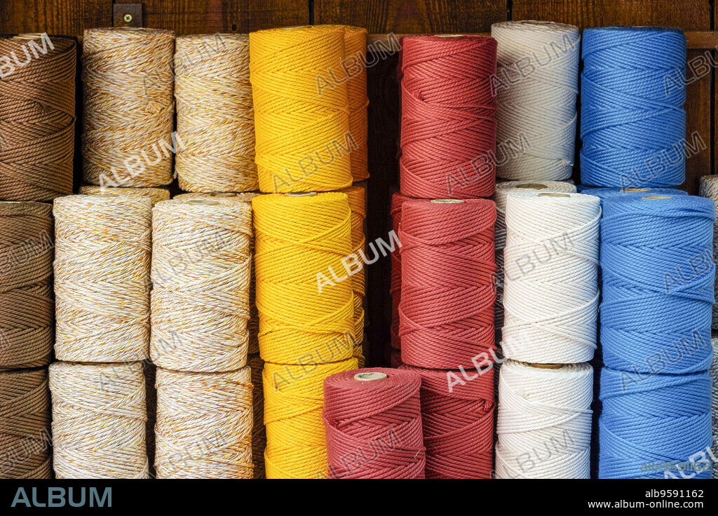 Multi-colored cotton threads, Ca'n Garanya, a traditional shop specializing in wicker and esparto grass, Manacor, Mallorca, Balearic Islands, Spain.
