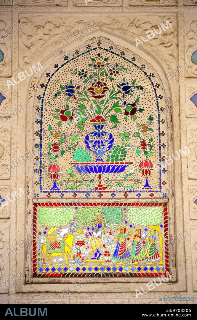 Lord Krishna playing flute & Gopi on stained glass work - Jaimandia - Diwan-I-Khas - Amber fort - Jaipur - Rajasthan - India.
