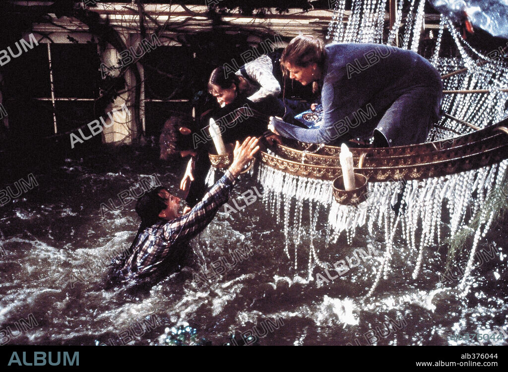 BONNIE HUNT, BRADLEY PIERCE, KIRSTEN DUNST y ROBIN WILLIAMS en JUMANJI, 1995, dirigida por JOE JOHNSTON. Copyright COLUMBIA TRI STAR.