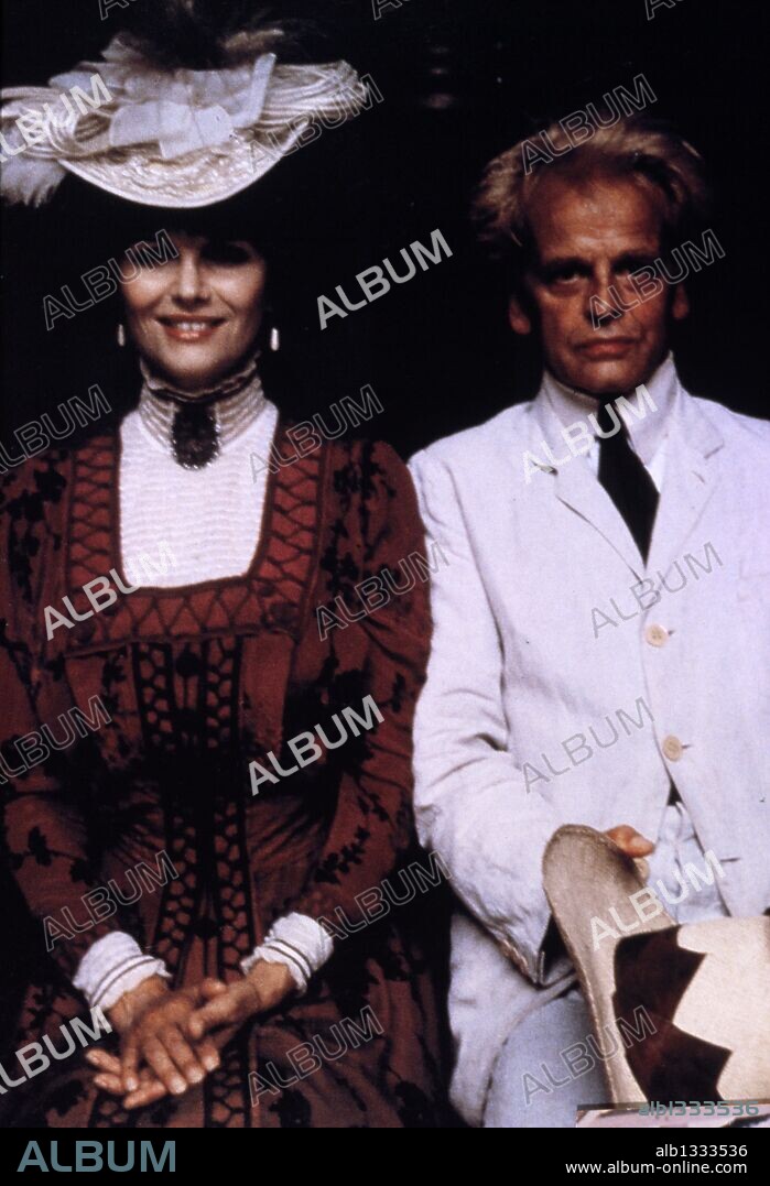 CLAUDIA CARDINALE and KLAUS KINSKI in FITZCARRALDO, 1982, directed by WERNER HERZOG. Copyright WERNER HERZOG FILMPRODUKTION.