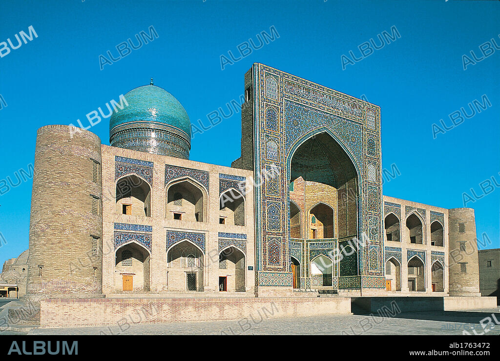 Mir i Arab Madrasa or Madrasah or Madrassa, by Unknown Artist, 1535-1536, 16th Century,. Uzbekistan, Bukhara, Mir-i Arab Madrasa Madrasah Madrassa. View of the facade of the madrasa madrasah madrassa Mir i Arab dome wall decoration majolica arches ogive pointed arch corner towers 2009 photograph.