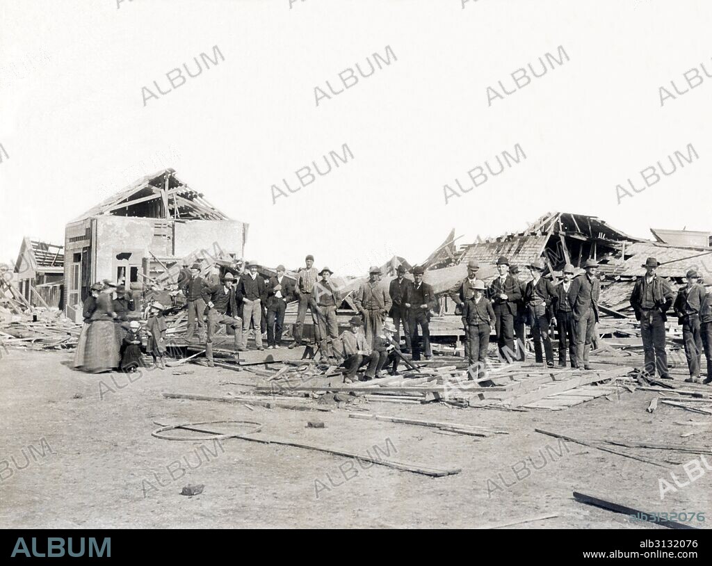 Bradshaw, Nebraska:  June 3, 1890 Citizens of the town standing amongst the ruins after a tornado came roaring through, killing 12 people and damaging the entire town.