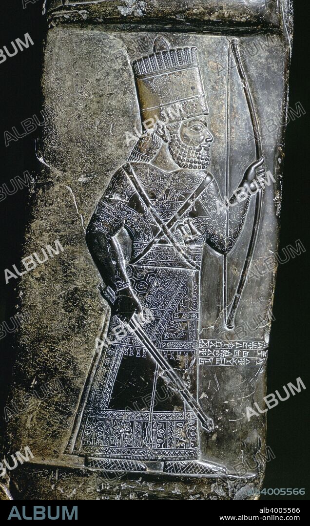 Portrait of Babylonian King Marduk-Nadin-Akke in black limestone. This appears on a Babylonian boundary-stone, recording the purchase of a field on the Shumunder Canal, by Marduk-Nasir, the King's Officer.