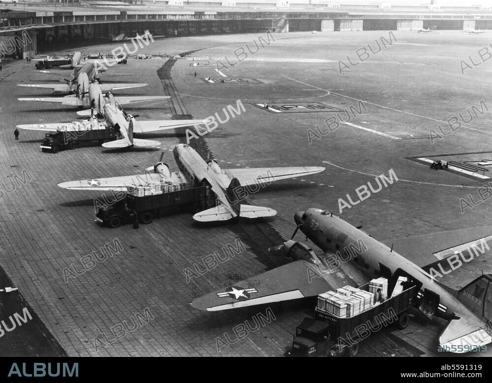 Berlin Blockade, 24th June 1948 - 12th May 1949. The Royal Air Force and United States Airforce flew over 200.000 flights in one year to provide West Berliners with daily necesseties during the Berlin blockade. Planes are being unlaoded. Photo.