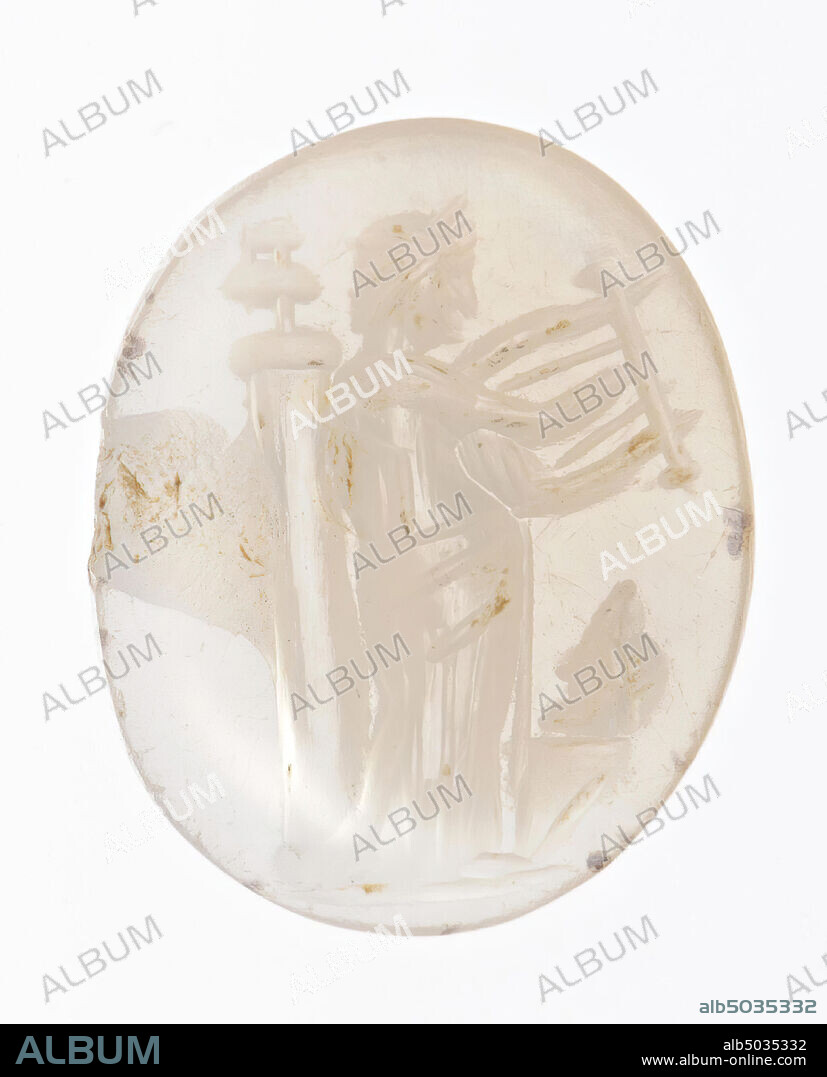 Vz: a woman is dressed in a chiton and himation that falls around her hips, in a Hellenistic way, she has in her left hand a lyre, which she plays with the other hand, she leans against a column on which a vase state, before the altar a mask., gem, intaglio, ringstone, chalcedony, Color: white, Shape: oval, Machined: Maaskant-Kleibrink, M., Catalog of the engraved gems at the Royal Coin Cabinet, 1978, p.60 , fig.2, type F1, edge cut back at the rear compared to front, Method: body mo, 12.5 x 10 mm, D. 2.5 mm, 2nd half 1st century BC. - early 1st century AD. -50 BC.
