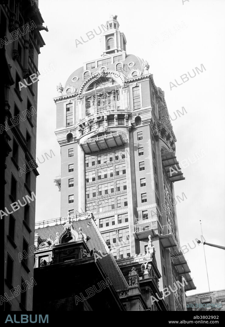 The Singer Building at Liberty Street and Broadway in Lower Manhattan's Financial District, was a 47-story office building completed in 1908 as the headquarters of the Singer Manufacturing Company. The building was commissioned by Frederick Bourne, who hired architect Ernest Flagg, an early exponent of the Beaux-Arts architectural style. The 12 story base of the building filled an entire block front, while the tower above was relatively narrow. The tower floors were squares only 65 feet on a side. It was demolished in 1968, together with the adjacent City Investing Building, and is now the site of 1 Liberty Plaza. When it was demolished, it was the tallest building ever to be demolished, and is still the third-tallest building ever to be destroyed (after the World Trade Center towers) and the tallest to be purposely demolished by its owner. Photographed by Jack Boucher for Historic American Buildings Survey, September 1967.