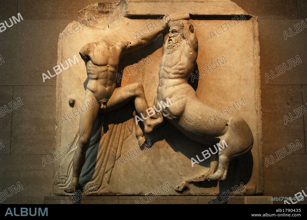 Greek Art. Metope on the south side of the Parthenon. 5th century B.C. A centaur is raised to strike a Lapith that defends himself with his hands and feet. Metope XXVI. It comes from the Acropolis in Athens. British Museum. London. England. UK.