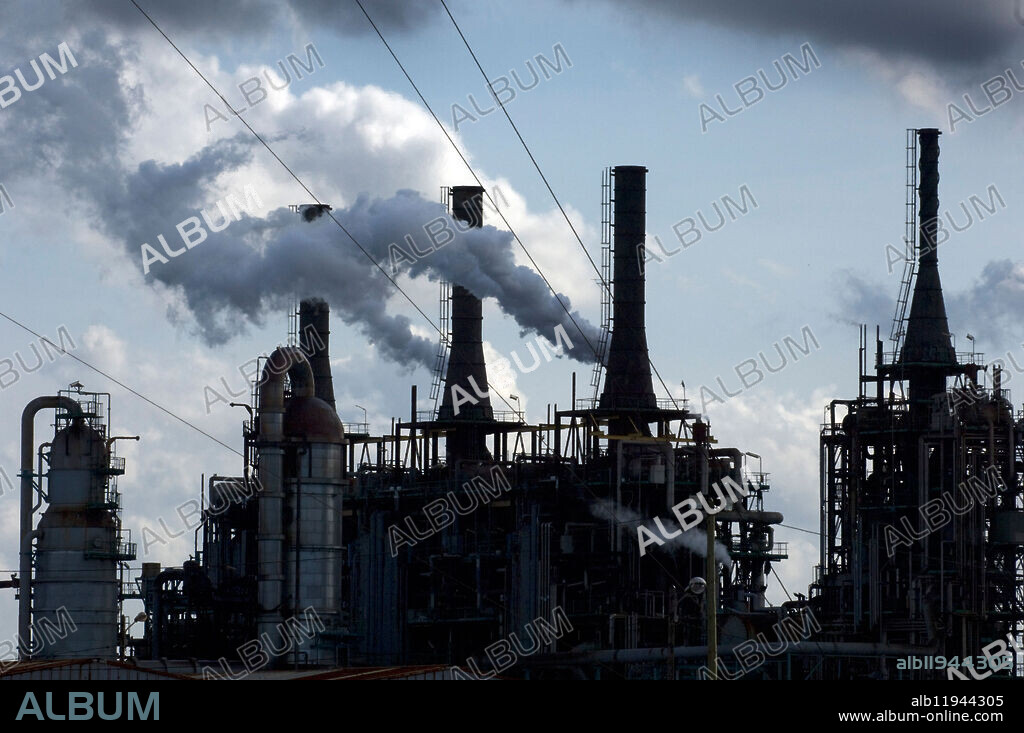Steam billows from the Total Petroleum Oil Refinery at Dunkirk Dunqurque in Northern France. Image shot 2008. Exact date unknown.