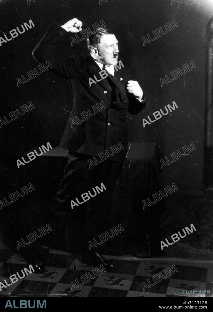 German Nazi leader Adolf Hitler, rehearsing a  speech in front of the mirror, 1933.