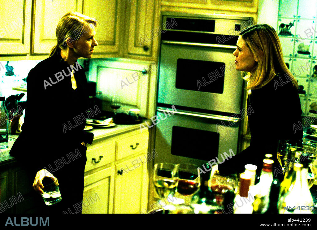 CLEA DUVALL and NAOMI WATTS in 21 GRAMS, 2003, directed by ALEJANDRO GONZALEZ IÑARRITU. Copyright FOCUS FILMS INC. / SHELDON, JIM.