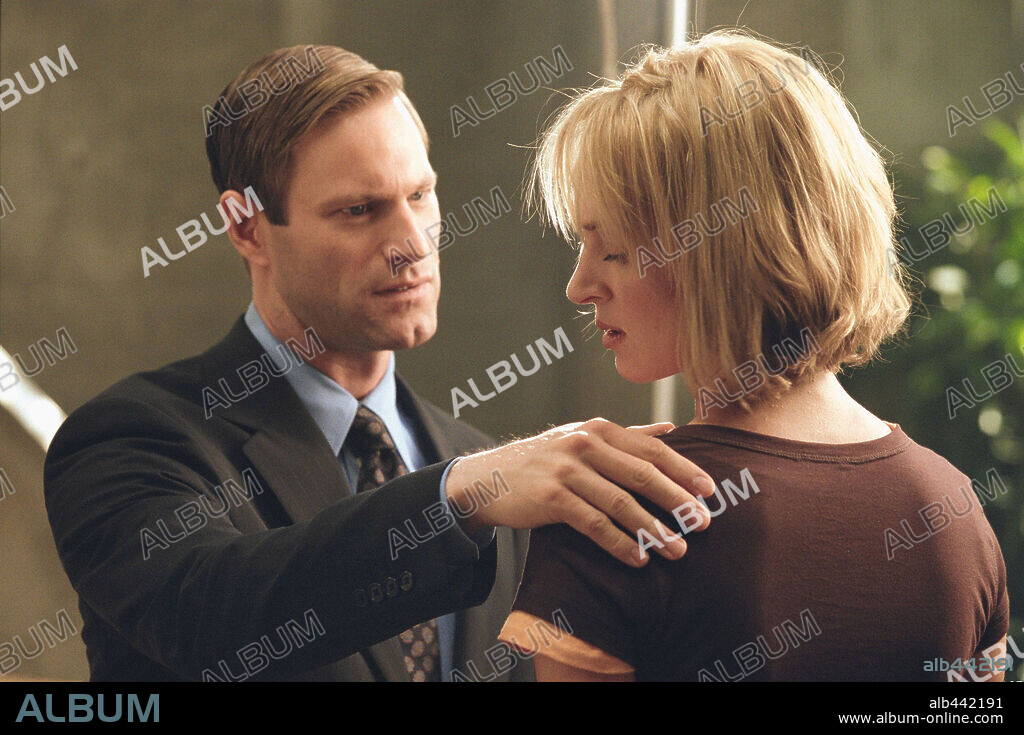 AARON ECKHART and UMA THURMAN in PAYCHECK, 2003, directed by JOHN WOO. Copyright PARAMOUNT/DREAMWORKS/DAVIS ENT/LION ROCK PROD./SOLOMON/HACKE / CURRAN, DOUGLAS.