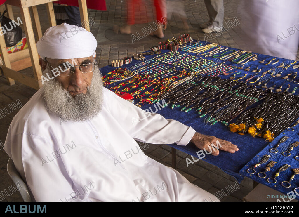Merchant in Muscat's Souk, Muscat, Oman, Middle East.