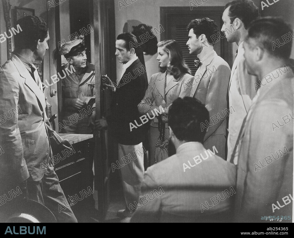 HUMPHREY BOGART, LAUREN BACALL and WALTER BRENNAN in TO HAVE AND HAVE NOT, 1944, directed by HOWARD HAWKS. Copyright WARNER BROTHERS.
