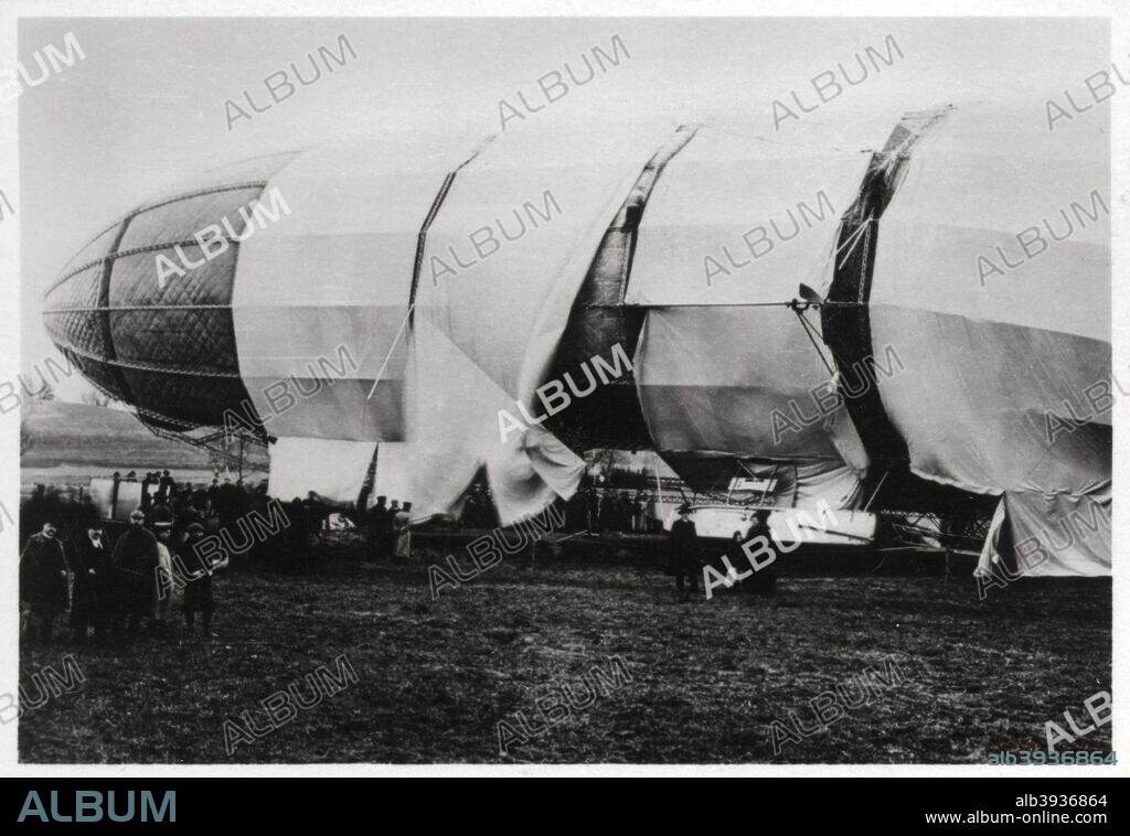 Zeppelin LZ2 after its destruction, 1906 (1933). The second Zeppelin to be built, LZ2 made its only flight on 17th January 1906. The airship's engines failed and it was forced to land in the Allgau Mountains, where it was damaged beyond repair by a storm. Parts of the airship were salvaged and used in the construction of its successor, LZ3. A photograph from Zeppelin-Weltfahrten, Vom ersten Luftschiff 1899 bis zu den Fahrten des LZ127 Graf Zepplin 1932, Dresden, 1933.