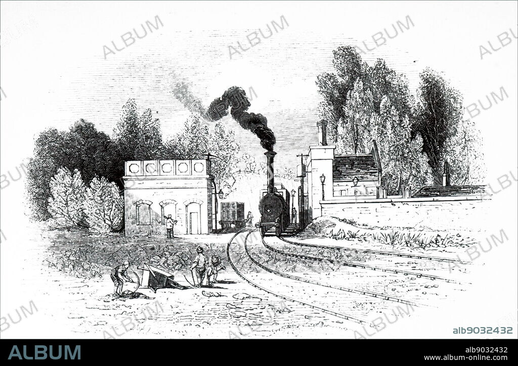Engraving depicting Berkhamsted Railway Station, Hertfordshire. On top of one of the buildings is a water tank used to supply locomotives. Dated 19th century.