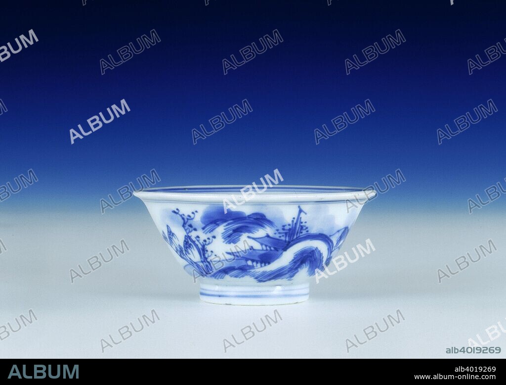 Blue and white tea cup, early Kangxi period, Qing dynasty, China, 1662-1683. A small blue and white shallow cup with slightly flared rim decorated with wet splashed and pencil drawn decoration in the style of the 'Master of the Rocks'. The interior is decorated with a pavilion by a lake, the exterior with a river and landscape scene of a sampan, trees and pavilions in the same style. The blue is of particularly good colour. The base has a three character private mark surrounded by a double circle in underglaze blue.