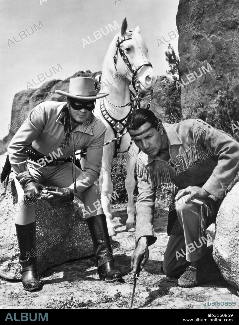 Hollywood, California: c. 1953 A promptional shot from the Lone Ranger television series, with the Lone Ranger played by Clayton Moore and his sidekick Tonto by Jay Silverheels, and the Lone Ranger's horse, Silver.
