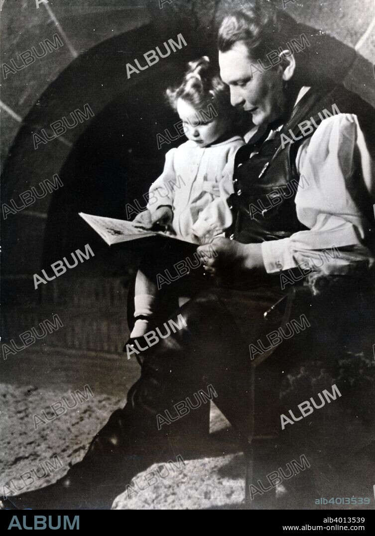 Hermann Göring, German Nazi politician and military leader, with his daughter Edda, c1939-c1942. A decorated World War I fighter ace who flew with Baron Manfred von Richthofen's squadron, Göring (1893-1946) joined the Nazi party in 1922. The following year he was involved in the Munich Beer Hall Putsch alongside Adolf Hitler. After the Nazis came to power in 1933, Göring became one of the new regime's leading figures. He commanded the Gestapo until 1934, when he handed its command over to Heinrich Himmler, and from 1935 onwards was commander of the Luftwaffe, the German air force. Captured by the Allies at the end of the Second World War, Göring was convicted of war crimes and crimes against humanity at the Nuremberg Trials, but committed suicide the night before he was due to be executed. Edda Göring was born in 1938.