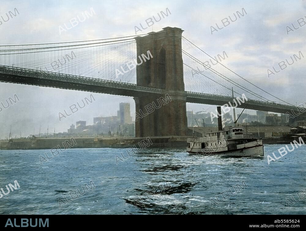 New York (USA), Brooklyn Bridge. (1869-83 erbaut von Johann und Washington Röbling). Der East River mit Brooklyn Bridge. Foto, koloriert, 1905 (Waldemar Abegg).