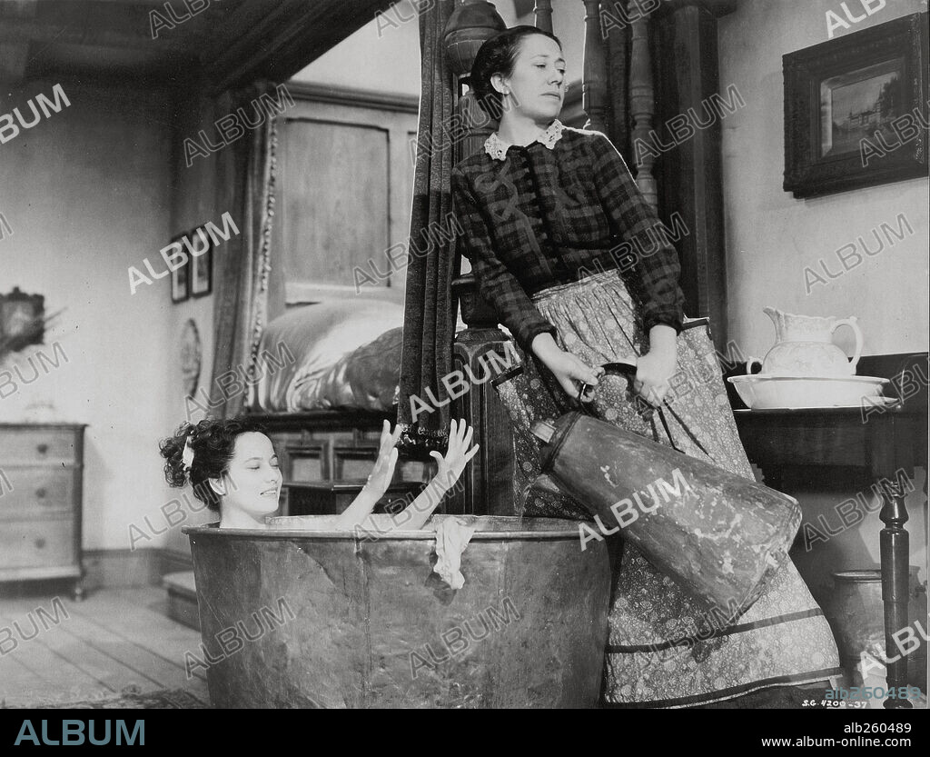 FLORA ROBSON and MERLE OBERON in WUTHERING HEIGHTS, 1939, directed by WILLIAM WYLER. Copyright UNITED ARTISTS.