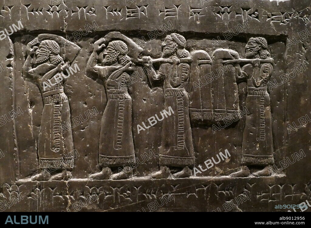 Detail from the Black Obelisk, of Shalmaneser III. A black limestone Assyrian sculpture with scenes in bas-relief and inscriptions. It comes from Nimrud (ancient Kalhu), in northern Iraq, and commemorates the deeds of King Shalmaneser III (reigned 858-824 BC).