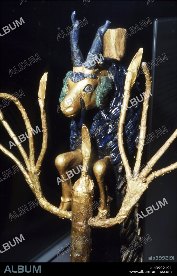 Ram or Goat in a Bush from Ur, Early Dynastic, 2600 BC. Statuette of a goat perched against a bush looking for food in gold and lapis lazuli. Ur was an important Sumerian city-state in ancient Mesopotamia. At British Museum.