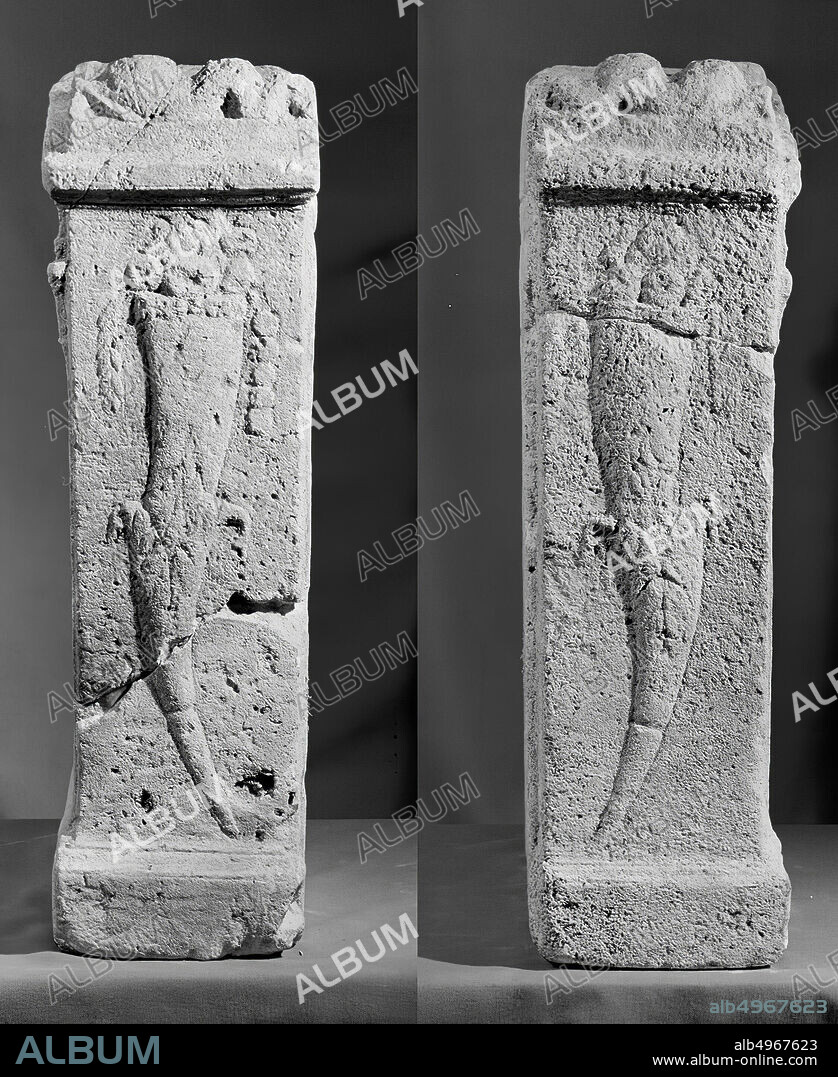Altar with niche, limestone. Nehalennia standing, with left foot on the stern of the ship. Right and left: horn of plenty. Back: curtain. On top: 2 apples at the front, the rolls or cushions have been replaced by sea monsters or dolphins. Restored from 2 pieces., Altar, stone, limestone, 66 x 41.5 x 18 cm, 110 kg, roman 150-250, the Netherlands, Zeeland, Noord-Beveland, Colijnsplaat, Oosterschelde.