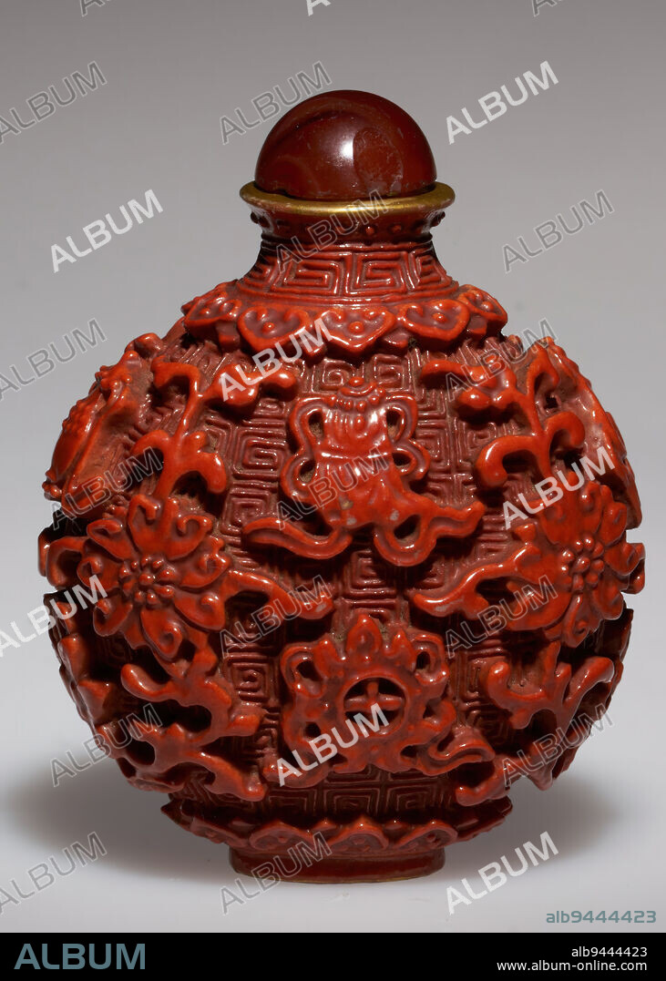 Snuff Bottle, 1780-1880, 2 1/2 x 2 1/2in. (6.4 x 6.4cm), Porcelain, amber, China, 18th century, This bottle depicts the Eight Treasures of Buddhisma double fish, a conch shell, a wheel, a vase, a lotus flower, a victory banner, a knot, and a parasolseparated by chrysanthemum blossoms. The Eight Treasures represent the eight-fold path of Buddhism, a series of tenets that, when followed, lead to a virtuous life. They are also believed to be good luck. Along with the chrysanthemum blossoms, a symbol of vitality, this bottle is covered with symbols of good fortune.