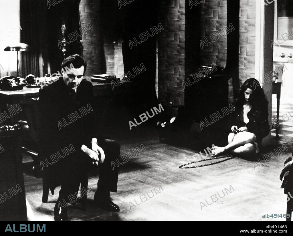 CHARLOTTE RAMPLING and DIRK BOGARDE in THE NIGHT PORTER, 1974 (IL PORTIERE DI NOTTE), directed by LILIANA CAVANI. Copyright ITAL-NOLEGGIO CINEMATOGRAFICO/LOTAR FILM PRODUCTIONS.