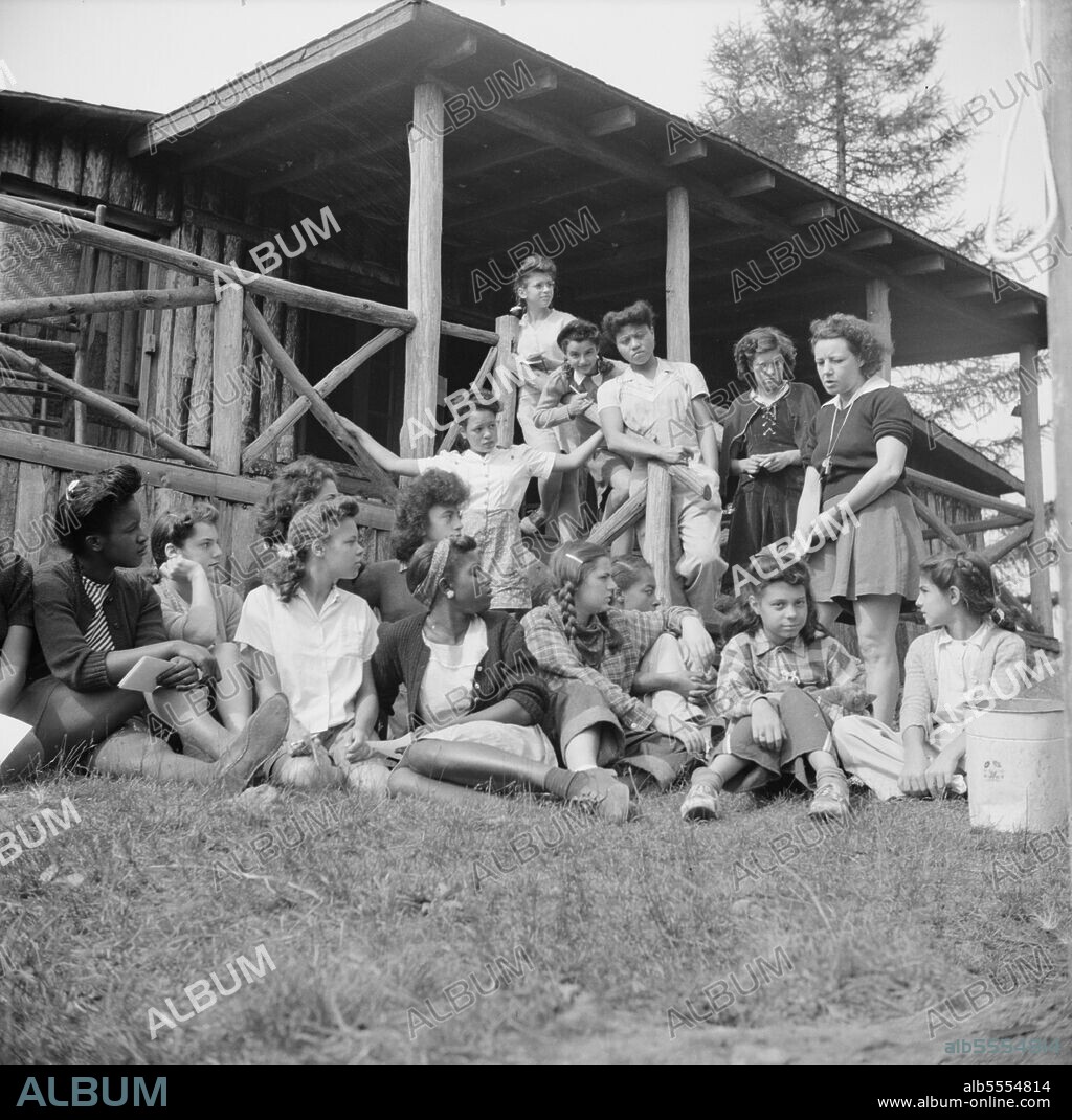 GORDON PARKS. Arden, New York. Interracial activities at Camp Gaylord White, where children are aided by the Methodist Camp Service. The democratic council planning a day's activity.