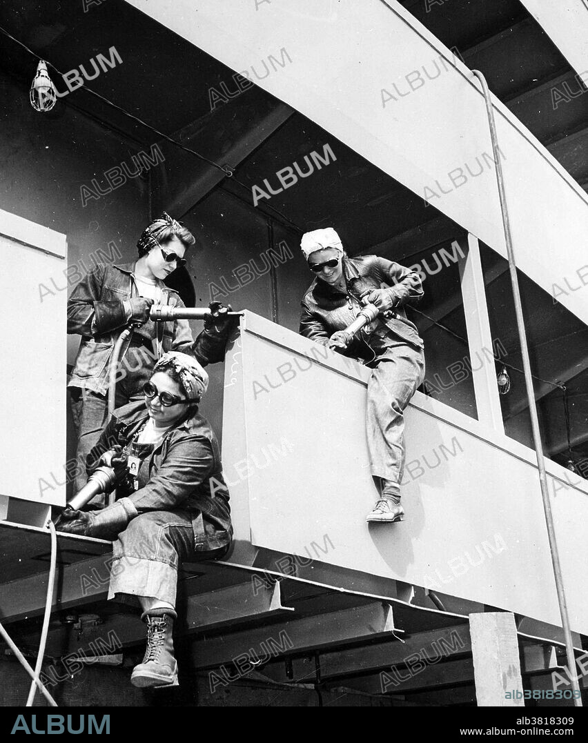 "Chippers." Women war workers of Marinship Corp, 1942. Marinship Corporation was a shipbuilding company of the United States during World War II, created to build the shipping required for the war effort. Founded in 1942, the shipyard built 93 cargo ships and oil tankers, before being wound up in 1945. On a ship, there are many panels that get welded together to form the walls or bulkheads. Where the welder closed up the seams of the panels, there is a bubbled weld line. The iron chipper goes along with a hammer and chisel and chips off the weld excess to make it smooth. One of the most dramatic changes during World War II was the number of women who went to work. As the armed forces filled its ranks with manpower, industry filled its jobs with womanpower. Conditions were sometimes harsh and pay was not always equal, the average man working in a wartime plant was paid $54.65 per week, while women were paid about $31.50.