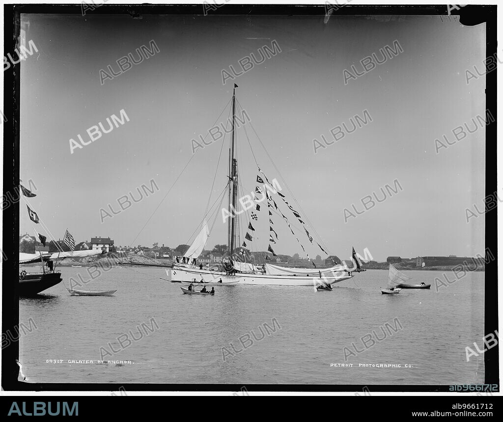 Galatea at anchor, 1886. Note clothes hung out to dry on deck.