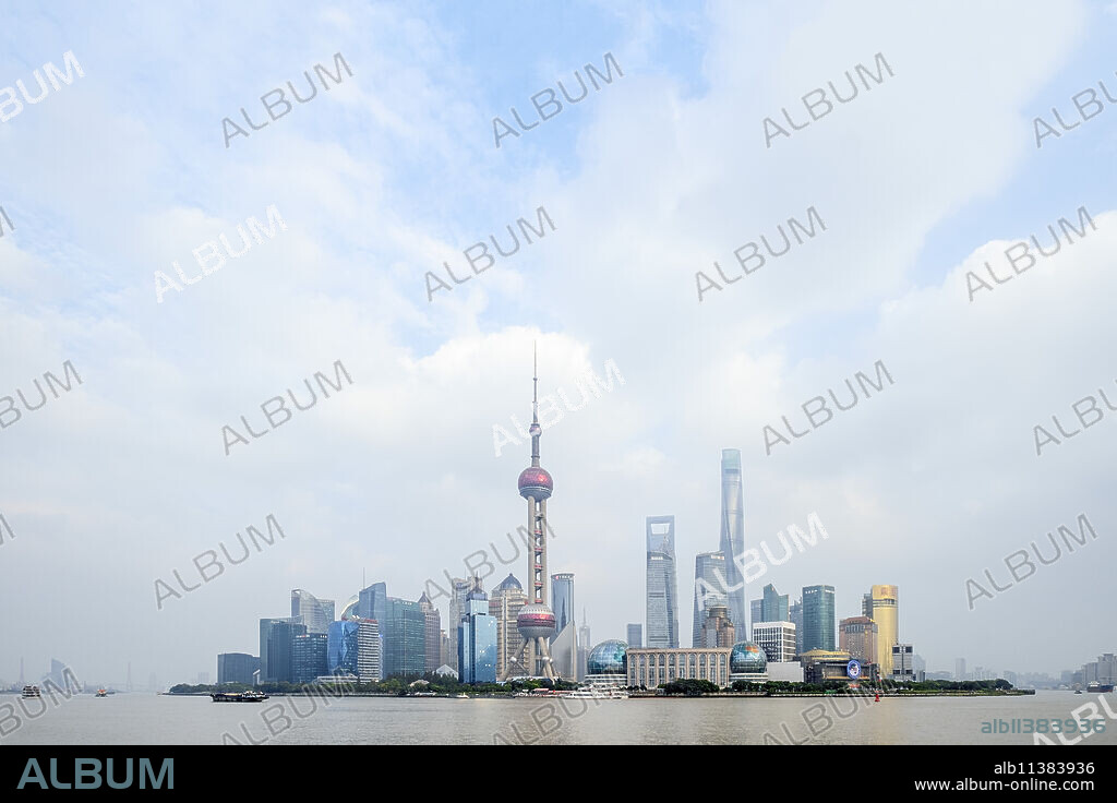The Shanghai city skyline with the Oriental Pearl TV Tower, the Shanghai Tower and the Shanghai World Financial Center, Pudong, Shanghai, China, Asia.